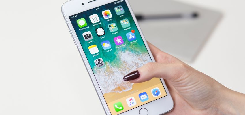 The woman is experiencing a problem while signing a document through her iPhone.