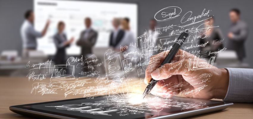 Close-up of a person signing a document on a tablet as the team uses a contract management platform.